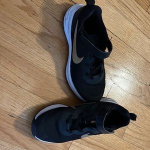 Boys Black and Gold Nike sneakers